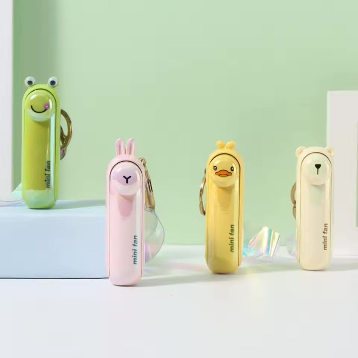 Mini Ventilator Portabil cu Breloc – Răcorește-te oriunde, oricând!