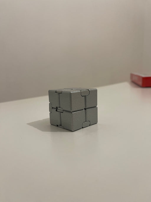 Infinity Cube – Cub Antistres Metalic pentru Fidget și Relaxare