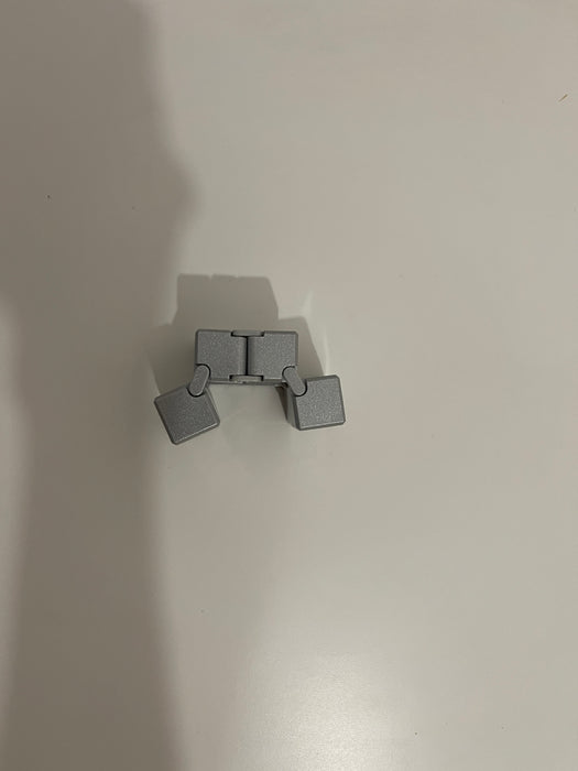 Infinity Cube – Cub Antistres Metalic pentru Fidget și Relaxare